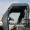 BobCat 3400 Full Cab Enclosure | Aero-Vent Hard Windshield - w/ doors in rolled back position
