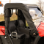 Kymco UXV500 Full Cab Enclosure - passenger door rolled and stored for traveling
